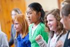 Four students form a line